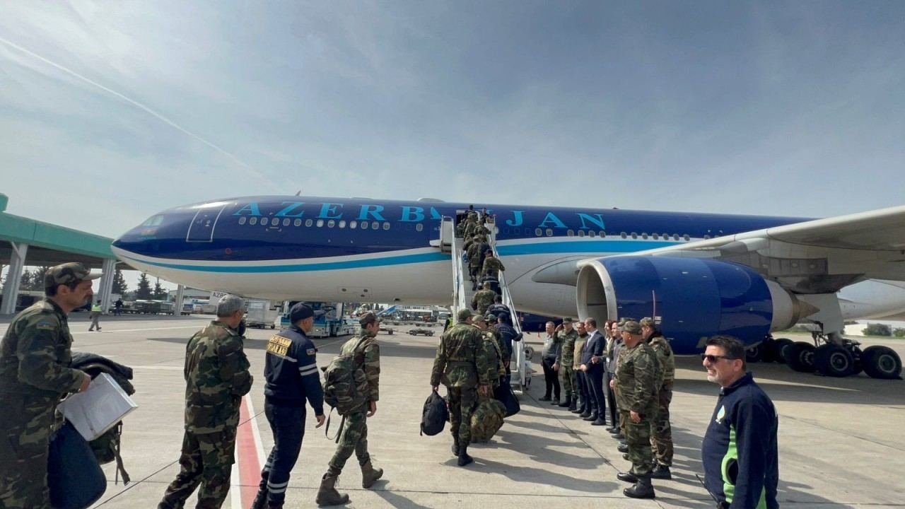 Another rescue team of Azerbaijan's Emergency Situations Ministry returning from quake-hit Türkiye ( TETS)